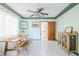 Bright dining room with white tile flooring and decorative accents at 1274 E Edgemont Ave, Phoenix, AZ 85006