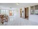 A spacious sunroom with tile flooring and lots of natural light at 1274 E Edgemont Ave, Phoenix, AZ 85006