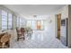 A spacious sunroom with tile flooring and lots of natural light at 1274 E Edgemont Ave, Phoenix, AZ 85006