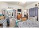 Spacious bedroom with hardwood floors, walk-in closet, and en-suite bathroom at 1347 S Oak Rd, Maricopa, AZ 85139