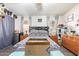 Comfortable bedroom featuring hardwood floors, natural light, and a peaceful ambiance at 1347 S Oak Rd, Maricopa, AZ 85139