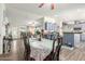 A well-lit dining area blends seamlessly with the kitchen, creating a warm and inviting space at 1347 S Oak Rd, Maricopa, AZ 85139