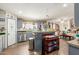 Open kitchen with blue cabinets and lots of counter space, great for meal preparation and gathering at 1347 S Oak Rd, Maricopa, AZ 85139