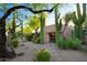 Landscaped front yard with desert plants, cacti, and gravel at 1637 N Quartz Valley Rd, Scottsdale, AZ 85266