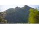 Beautiful rugged mountain view with desert foliage and scattered rocks at 1637 N Quartz Valley Rd, Scottsdale, AZ 85266