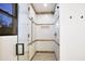 Modern tiled shower featuring a glass enclosure and bronze fixtures at 1637 N Quartz Valley Rd, Scottsdale, AZ 85266