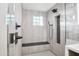 Modern shower features glass enclosure, seat, and tile accents at 1637 N Quartz Valley Rd, Scottsdale, AZ 85266