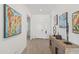 Bright entryway featuring decorative art and console table at 17018 W Saguaro Park Ln, Surprise, AZ 85387