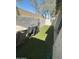 Artificial turf side yard with BBQ and low maintenance landscaping at 1718 S Longmore St # 53, Mesa, AZ 85202