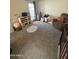 Bedroom with carpet, a white door, and natural light at 1718 S Longmore St # 53, Mesa, AZ 85202