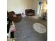 Bedroom with gray carpet and a brown reclining chair at 1718 S Longmore St # 53, Mesa, AZ 85202