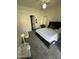 Bedroom with carpet, ceiling fan, and glass patio door to backyard at 1718 S Longmore St # 53, Mesa, AZ 85202