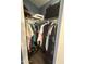 Walk-in closet with shelving and hanging racks, providing ample storage space for clothes, shoes, and accessories at 1718 S Longmore St # 53, Mesa, AZ 85202