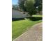 Well-maintained green space with mature trees and manicured lawns in a peaceful community at 1718 S Longmore St # 53, Mesa, AZ 85202