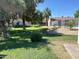 Well-maintained community green space with mature trees and landscaped lawns, offering a serene environment at 1718 S Longmore St # 53, Mesa, AZ 85202