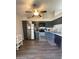 Kitchen featuring stainless steel appliances, gray cabinetry, and modern finishes at 1718 S Longmore St # 53, Mesa, AZ 85202