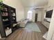 Open living room with stylish decor, a comfortable sectional sofa, and a view of the dining area at 1718 S Longmore St # 53, Mesa, AZ 85202