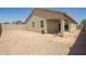 Exterior view of the home with the backyard at 1748 W Cameron Blvd, Coolidge, AZ 85128