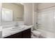 Bathroom with vanity and sink, toilet and shower-bath combination at 1748 W Cameron Blvd, Coolidge, AZ 85128