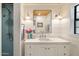 Charming bathroom with shiplap walls, a cedar ceiling, and modern fixtures at 1825 E Palo Verde Dr, Phoenix, AZ 85016