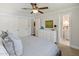 Bright bedroom showcasing a white dresser and glimpses into a modern bathroom at 1825 E Palo Verde Dr, Phoenix, AZ 85016
