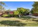 Cozy brick home with mature landscaping and a well-maintained front yard at 1825 E Palo Verde Dr, Phoenix, AZ 85016