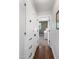 Hallway features built-in storage and leads to other rooms in the home at 1825 E Palo Verde Dr, Phoenix, AZ 85016