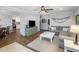 Open-concept living room seamlessly connects to the kitchen with hardwood floors at 1825 E Palo Verde Dr, Phoenix, AZ 85016