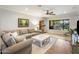 Bright living room with a large window, comfortable seating, and stylish decor at 1825 E Palo Verde Dr, Phoenix, AZ 85016