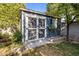 Well maintained backyard shed with double doors and adjacent garden bed at 1825 E Palo Verde Dr, Phoenix, AZ 85016