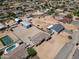 Scenic aerial view of the home, surrounding properties and desert landscape at 19711 W Colter St, Litchfield Park, AZ 85340