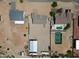 A sprawling property with home, workshop, tennis court, desert landscape and outdoor pool at 19711 W Colter St, Litchfield Park, AZ 85340