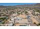 Expansive suburban community in a desert landscape with mountains in the background at 19711 W Colter St, Litchfield Park, AZ 85340