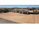 Stunning property with a spacious front yard, three car garage, and mountain views at 19711 W Colter St, Litchfield Park, AZ 85340