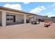 Large backyard featuring a covered patio perfect for outdoor entertaining at 19711 W Colter St, Litchfield Park, AZ 85340