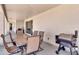 Covered patio including an outdoor dining area and a grill at 19711 W Colter St, Litchfield Park, AZ 85340