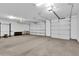 Spacious three-car garage with ample room for parking and storage at 19711 W Colter St, Litchfield Park, AZ 85340