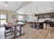 Modern kitchen with dark cabinets, sleek countertops, stainless steel appliances, and convenient bar seating at 19711 W Colter St, Litchfield Park, AZ 85340