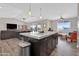 Kitchen island with granite countertops at 19711 W Colter St, Litchfield Park, AZ 85340