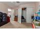 This bedroom features a closet and plenty of natural light from the window at 19719 N Castille Dr, Maricopa, AZ 85138