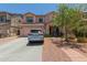 Charming two-story home features a well-manicured front yard and a spacious driveway at 19719 N Castille Dr, Maricopa, AZ 85138