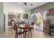 Eat-in kitchen with tile flooring, ample cabinet space and a neutral color palette at 19719 N Castille Dr, Maricopa, AZ 85138