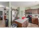 The kitchen features modern appliances and a functional island at 19719 N Castille Dr, Maricopa, AZ 85138