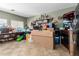 Spacious living room features tile flooring and a neutral color palette at 19719 N Castille Dr, Maricopa, AZ 85138