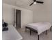 Bedroom features a ceiling fan and modern black out shades at 20128 W Jackson St, Buckeye, AZ 85326