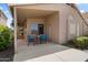 Inviting covered patio with seating, ideal for enjoying the outdoors in comfort at 20814 N Dries Rd, Maricopa, AZ 85138