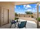 Cozy patio space with outdoor seating, perfect for enjoying the serene backyard view at 20814 N Dries Rd, Maricopa, AZ 85138