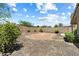 Large backyard with potential for creating a beautiful garden or play area at 20814 N Dries Rd, Maricopa, AZ 85138