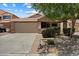 Attractive single-Gathering home with a well-maintained lawn and two-car garage, located in a friendly neighborhood at 20814 N Dries Rd, Maricopa, AZ 85138