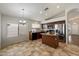 Spacious kitchen with modern appliances, lots of cabinets, and a center island perfect for meal prep at 20814 N Dries Rd, Maricopa, AZ 85138